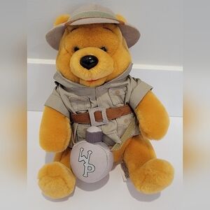 Walt Disney World Winnie the Pooh safari plush bear.